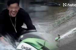 Con trai sao nữ lái môtô 'câu view' giữa phố ngập ở Bangkok