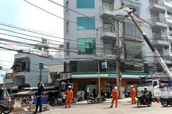 Tp.HCM: Hàng chục trụ điện án ngữ đường Chu Văn An được di dời