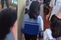 Nữ sinh lớp 10 bắt bạn quỳ gối, dí thuốc lá vào mặt, công an xác minh