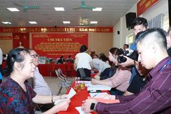 Những hộ dân Tương Mai đầu tiên nhận tiền bồi thường Dự án Trục không gian Quốc lộ 1A