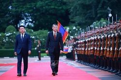 Lễ đón Thủ tướng Lê Minh Hưng thăm chính thức CHDCND Lào