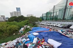 Quần áo chất đống như núi tại dự án đường Phạm Hùng - Lê Đức Thọ