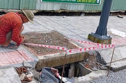 Rào chắn, căng dây cảnh báo tại các miệng cống 'lộ thiên' ngay sau phản ánh của Báo Công lý