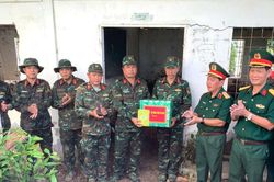 Tiếp sức lực lượng tìm kiếm quy tập hài cốt liệt sĩ