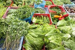 Giá rau củ TP.HCM đắt đỏ vì mưa lớn, nhiều loại đến 100.000 đồng/kg