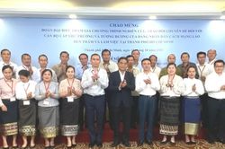 Chia sẻ kinh nghiệm công tác xây dựng Đảng và đào tạo cán bộ giữa TPHCM và Lào