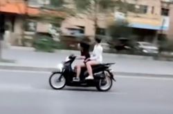 Cô gái đi SH không đội mũ bảo hiểm, lạng lách, đánh võng trên phố Hà Nội