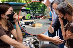Người chị kh&oacute;c ngất tại hiện trường vụ tai nạn khiến em g&aacute;i tử vong ở H&agrave; Nội