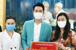 Ca sĩ Nguyễn Phi Hùng và Vy Oanh ủng hộ phòng chống dịch Covid-19