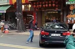 Xác định nguyên nhân nam thanh niên cầm thanh sắt đập xe BMW trên phố
