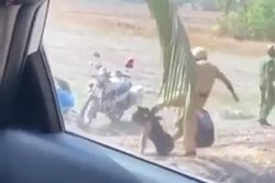 Xác minh clip CSGT đánh, đá 2 thanh niên ở bãi đất trống