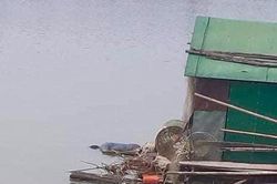 Phát hiện thi thể người đàn ông dạt vào lồng cá trên sông Lam