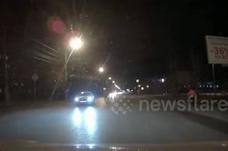 Ô tô húc bay tên trộm lên không trung khi hắn đang tẩu thoát