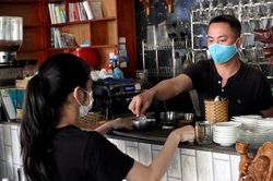 9X Đà thành mở cà-phê sách