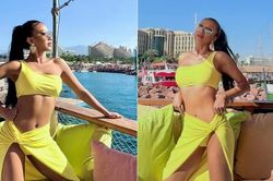 Kim Duyên mặc bikini vàng rực, khoe vóc dáng nóng bỏng ở Miss Universe