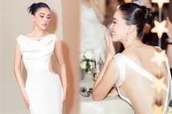 Tiểu Vy mặc kín bưng nhưng lại khiến fan giật mình khi quay lưng
