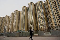 Fitch: Các công ty bất động sản Trung Quốc thiếu tiền mặt nghiêm trọng