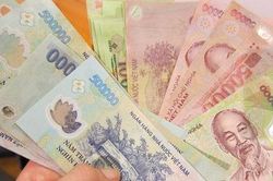 Tết đến lại lo tiền giả, làm sao để phân biệt tiền thật và tiền giả?