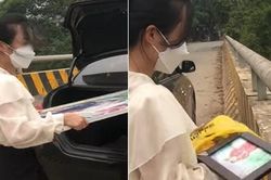 'Nóng giận mất khôn', người phụ nữ đem ảnh cưới quẳng xuống sông liền bị chỉ trích bởi 2 lý do này