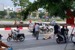 Thiếu tá CSGT bị 2 thanh niên vượt đèn đỏ đâm trọng thương