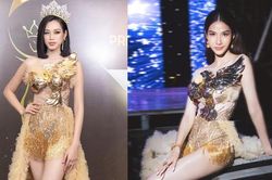 Cùng mặc váy phượng hoàng lộng lẫy, Đỗ Thị Hà - Hoàng Thùy khoe trọn đôi chân dài thẳng tắp