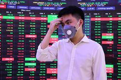 Chứng khoán trong nước rơi 16 điểm