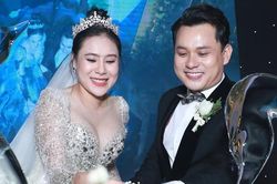 Váy cưới che bụng bầu của Hồ Bích Trâm