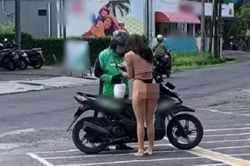 Chỉ mặc 'độc' quần chip và áo hai dây ngắn cũn ra nhận hàng, cô gái khiến shipper đỏ mặt