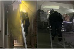 Nghẹt thở giây phút giải cứu 4 người mắc kẹt trong đám cháy lúc rạng sáng