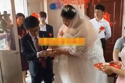 Dân tình xôn xao khi chú rể nhỏ con cưới cô dâu nặng hơn 200kg