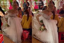 Đám cưới mùa mưa, cô dâu khổ sở 'bồng váy' về nhà chồng