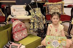 'Nữ đại gia quận 7' dát hàng hiệu từ đầu đến chân cho con