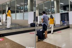 Lại thêm cô gái vô tư đứng trên băng chuyền sân bay quay video 'sống ảo'