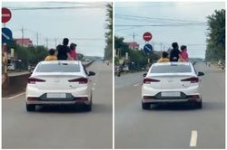 Tài xế cho trẻ em ngồi nóc ô tô 'hóng gió', netizen bất an