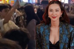 Hoa hậu Thùy Tiên bất ngờ 'tác động vật lý' lên người đứng bên cạnh khi bị bắt ép hát hò giữa phố đi bộ
