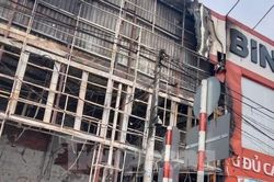Phong tỏa hiện trường, điều tra vụ cháy 2 cửa hàng tại Bình Dương
