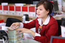 Ngân hàng xoay xở chờ nới hạn mức tăng trưởng tín dụng