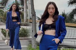 Lương Thùy Linh dạo phố với outfit thanh lịch, lang thang giữa chiều mưa phố thị