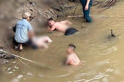 Người đàn ông kiệt sức sau khi liều mình nhảy xuống sông cứu người phụ nữ đuối nước