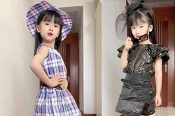 Người mẹ Trung Quốc cho con gái mặc váy bằng túi rác