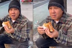 Quyền Linh ngồi vỉa hè ăn bánh mì như người vô gia cư, netizens 'dụi mắt' mãi mới nhìn ra MC quốc dân