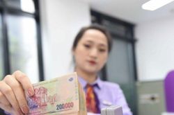 Ngân hàng Nhà nước nới room tín dụng thêm 1,5-2% cho toàn bộ hệ thống