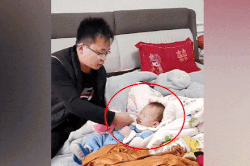 Ông bố Trung Quốc ru con bằng cách đặc biệt