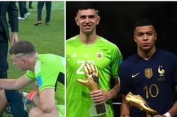 Thủ môn Argentina an ủi Mbappe nhưng bị chê là 'giả tạo' vì hành động sau khi nhận cúp