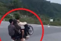 Clip: 3 'quái xế' đu bám, bốc đầu xe máy làm điều liều lĩnh gây phẫn nộ