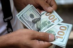 Đà tăng của USD dừng sau quyết định lãi suất của Fed