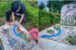 Nhói lòng cảnh ông bố ra thăm mộ con gái và trang trí thật đẹp
