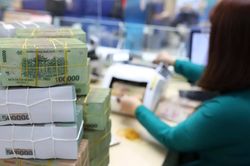 NHNN muốn siết cho vay sân sau