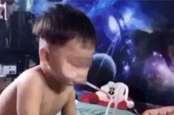 Xác minh clip người đàn ông nghi cho bé trai hút ma túy