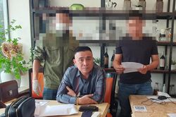 Bắt quả tang đối tượng cưỡng đoạt tài sản của doanh nghiệp